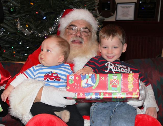 Children's Christmas Party at 8-100. 12-9-2012. Santa pays a visit . Photo by Vincent P. Tuzzolino